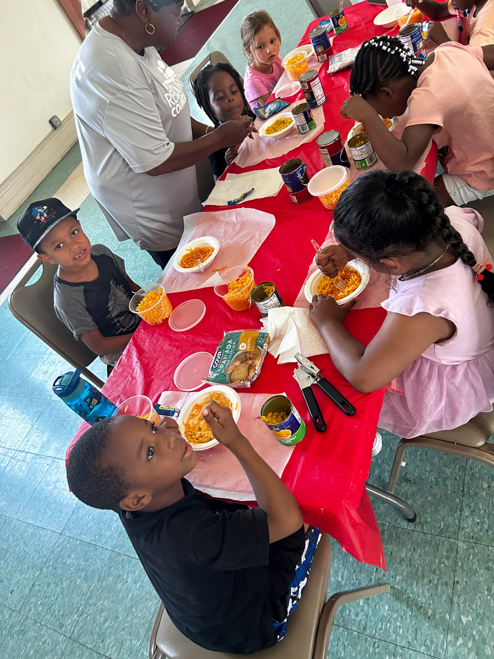 young children eating together at a table